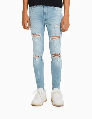Jeans skinny rotos pintura-BERSHKA Discount