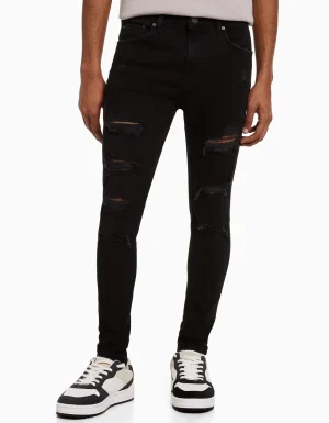 Jeans super skinny rotos-BERSHKA Discount