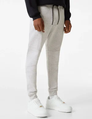 Pantalón felpa jogger cortes-BERSHKA Hot